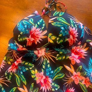 Two piece swim suit size 36B/ bottom size large. Very gently used.